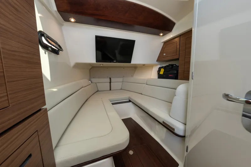 Slide: The Image of Luxurious interior of 2019 Boston Whaler 350 EX REALM with plush seating and modern amenities. - 34