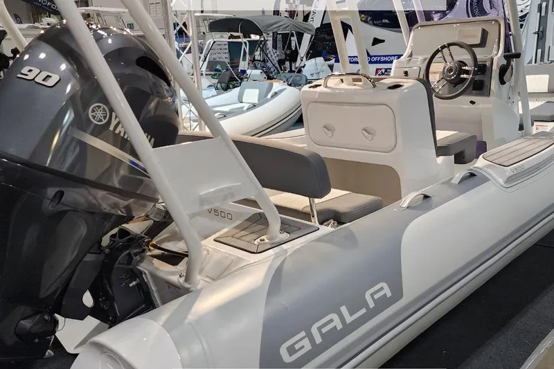 Slide: The Image of Gala V500 boat 2026 with Yamaha 90 engine at exhibition. - 10
