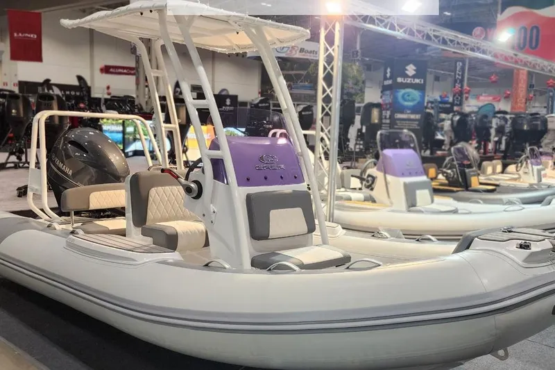 Slide: The Image of Gala V500 boat 2026 displayed at a trade show. - 11