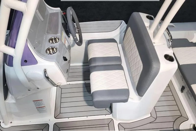 Slide: The Image of Interior of Gala V500 boat, 2026 model, featuring gray and white seating. - 7