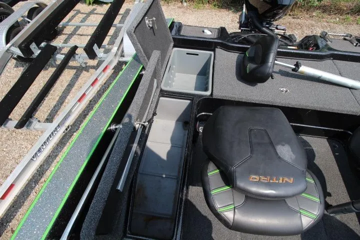 Slide: The Image of 2020 Nitro ZV20 Pro boat interior with storage compartments and seating. - 10