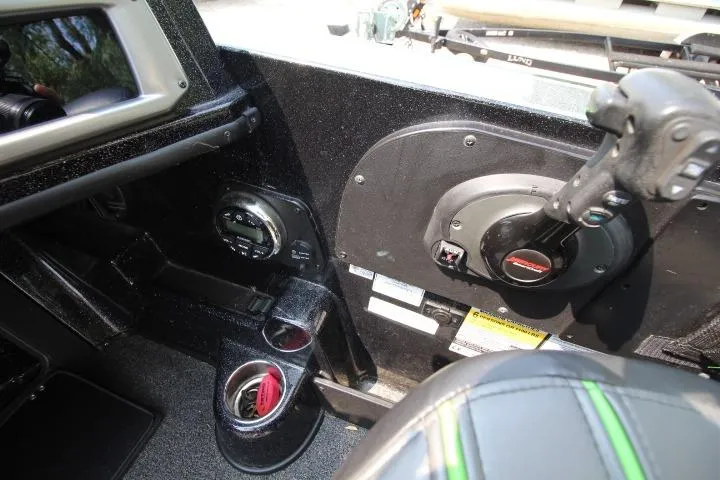 Slide: The Image of Interior of a 2020 Nitro ZV20 Pro boat showing controls and cup holders. - 15