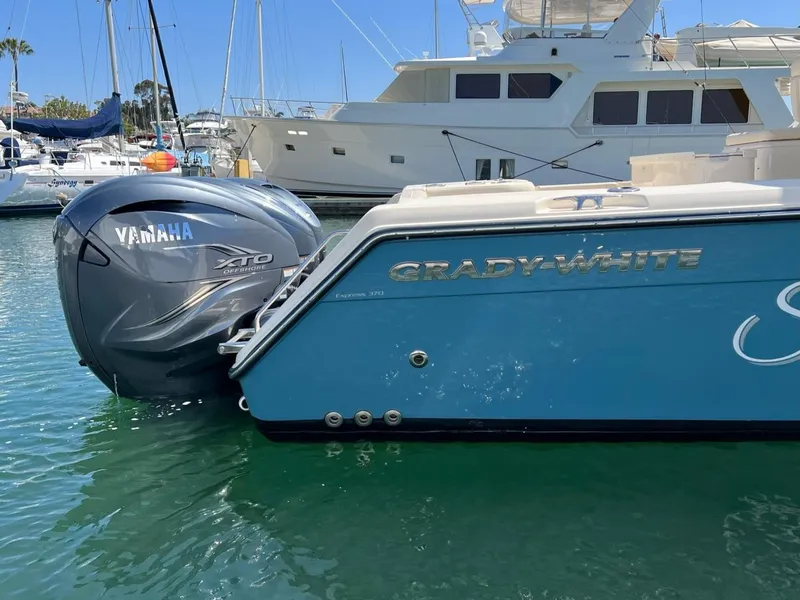 Slide: The Image of 2019 Grady-White Express 370 boat with Yamaha engine docked in marina. - 3