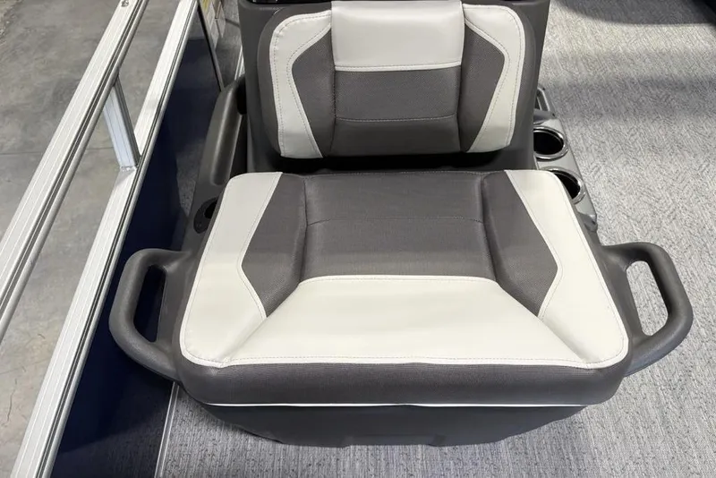Slide: The Image of 2026 Sun Tracker Bass Buggy 16 XL Select seat with gray and white upholstery. - 9