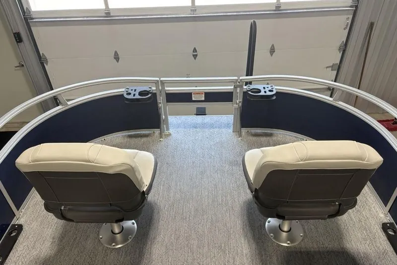 Slide: The Image of 2026 Sun Tracker Bass Buggy 16 XL Select pontoon boat with two swivel seats. - 3