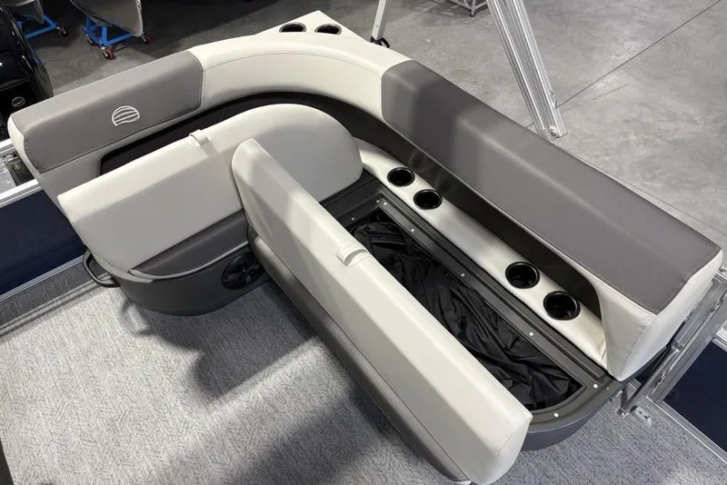Slide: The Image of 2026 Sun Tracker Bass Buggy 16 XL Select boat seating with storage and cup holders. - 20