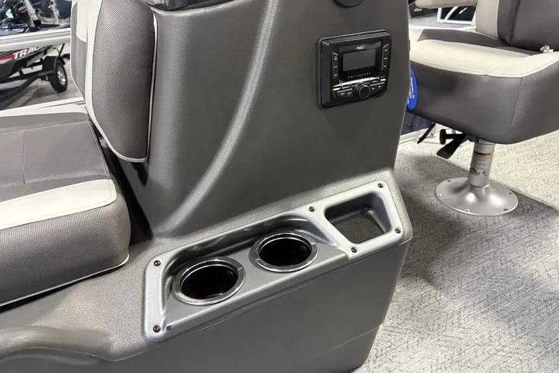 Slide: The Image of 2026 Sun Tracker Bass Buggy 16 XL Select interior with cup holders and seating. - 10