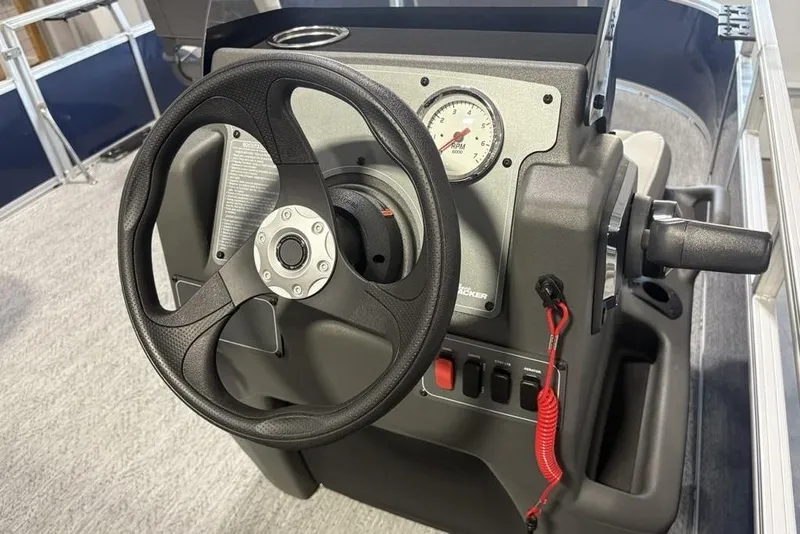 Slide: The Image of Steering console of 2026 Sun Tracker Bass Buggy 16 XL Select pontoon boat. - 21