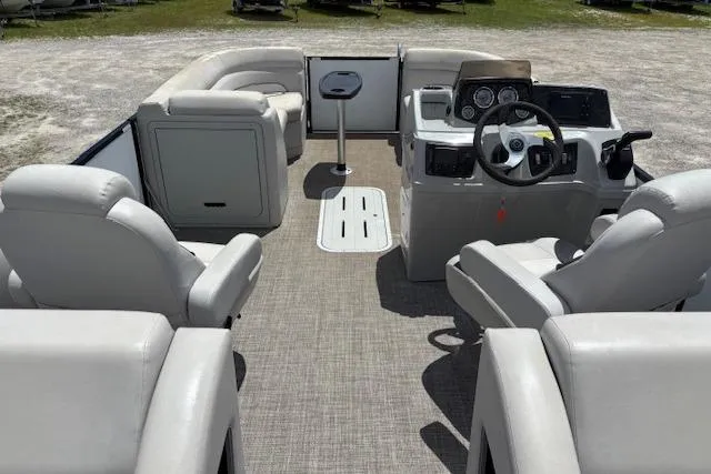 Slide: The Image of Interior of 2022 Sun Catcher 322 SS pontoon boat with plush seating and modern dashboard. - 6