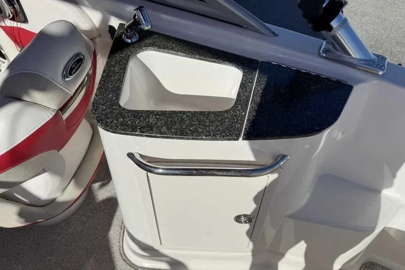 Slide: The Image of 2008 Chaparral 224 Extreme boat interior with sink and seating area. - 13