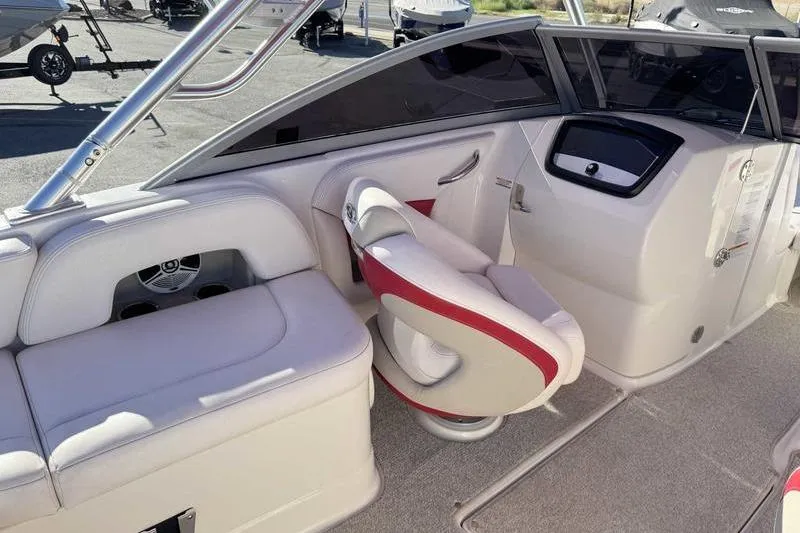 Slide: The Image of Interior of 2008 Chaparral 224 Extreme boat with seating and dashboard. - 3