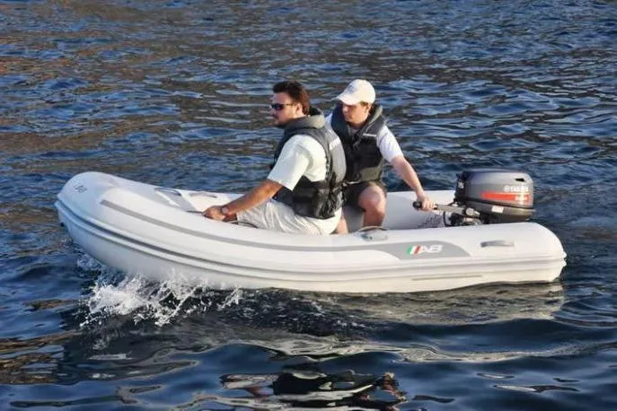 Slide: The Image of Two people in an AB Inflatables Navigo 10 VS inflatable boat, 2026 model. - 5