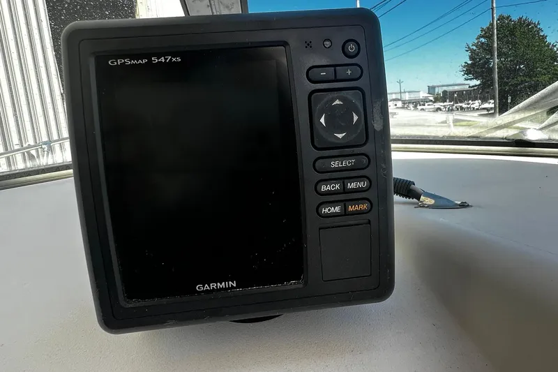 Slide: The Image of Garmin GPSMAP 547xs on 1992 Grady-White Explorer 244 boat dashboard. - 13