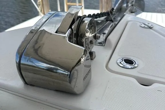 Slide: The Image of Chrome anchor winch on 2015 Everglades 295 Center Console boat deck. - 18