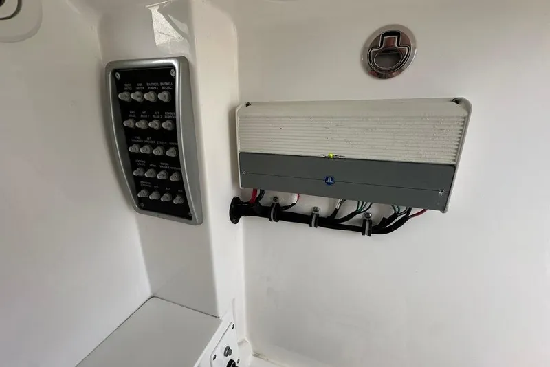 Slide: The Image of 2015 Everglades 295 Center Console boat electrical panel and wiring system. - 21