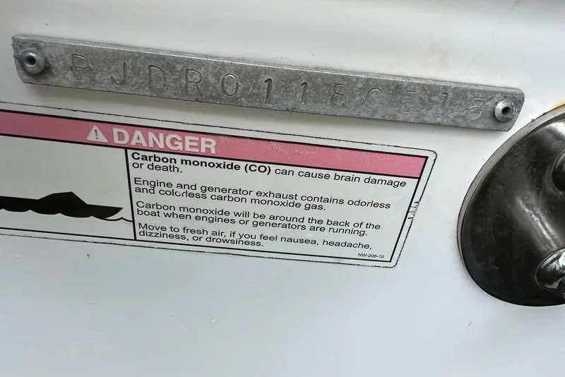 Slide: The Image of Warning label on 2015 Everglades 295 Center Console about carbon monoxide dangers. - 24