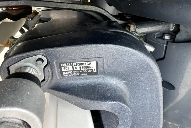 Slide: The Image of Close-up of Yamaha LF300XCA engine part on 2015 Everglades 295 Center Console boat. - 26