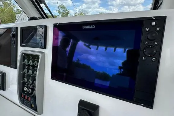 Slide: The Image of Control panel of 2015 Everglades 295 Center Console with Simrad display. - 35