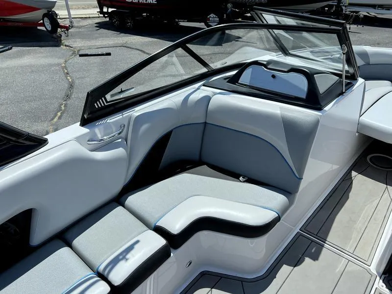 Slide: The Image of 2018 Moomba Mojo™ boat interior with sleek seating and modern design. - 4