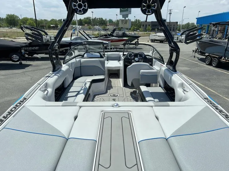 Slide: The Image of 2018 Moomba Mojo™ boat interior with spacious seating and modern design. - 8