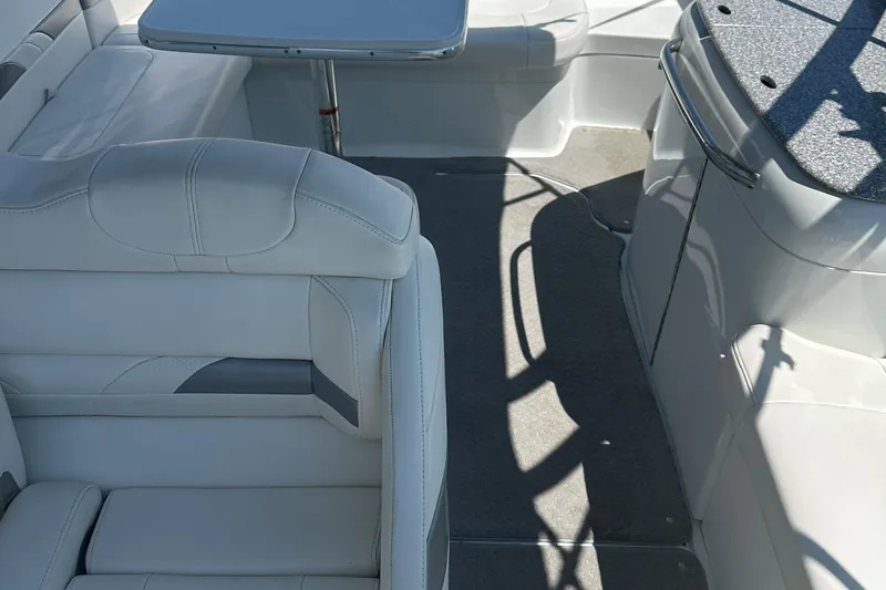 Slide: The Image of 2007 Formula 260 Bowrider interior with white seating and table. - 9