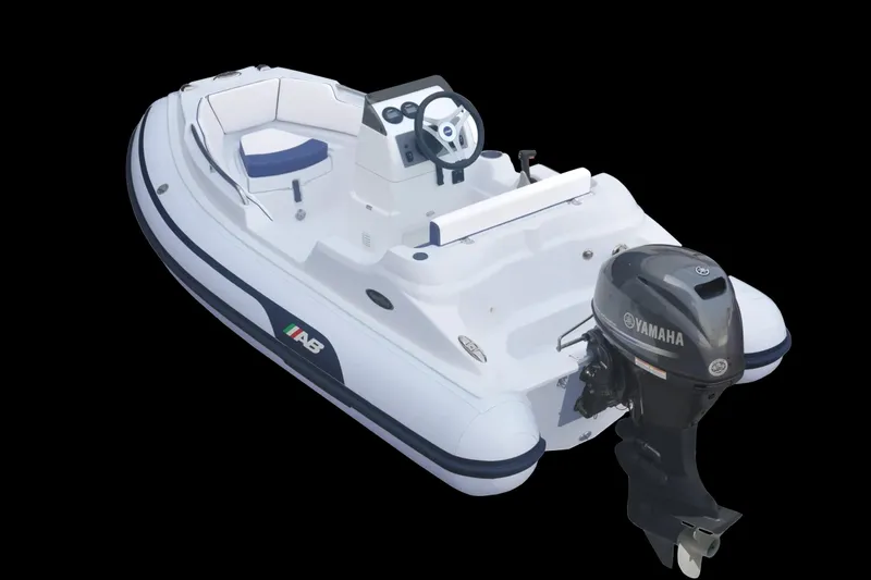 The Image of 2026 AB Inflatables Nautilus 11 DLX boat with Yamaha outboard motor, white and blue design. - 0