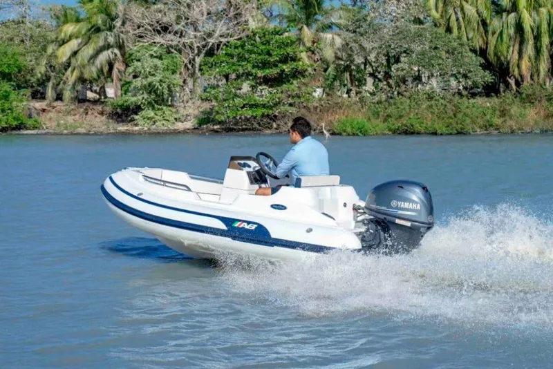 Slide: The Image of 2026 AB Inflatables Nautilus 11 DLX on water with Yamaha engine. - 8