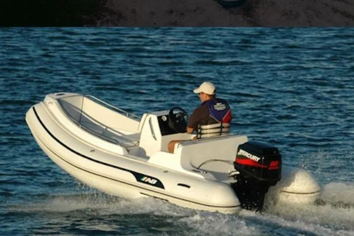 Slide: The Image of 2026 AB Inflatables Nautilus 13 DLX on the water. - 6