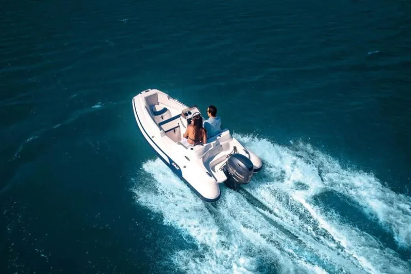 Slide: The Image of 2026 AB Inflatables Nautilus 13 DLX on open water. - 8