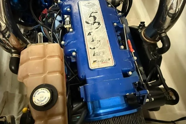 Slide: The Image of 2004 Fountain 42 Lightning engine, blue with Mercury Racing 525 EFI label. - 5