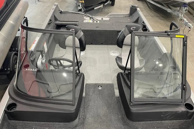 Slide: The Image of 2026 Crestliner 1750 Hawk WT J boat interior with dual consoles and seating. - 15