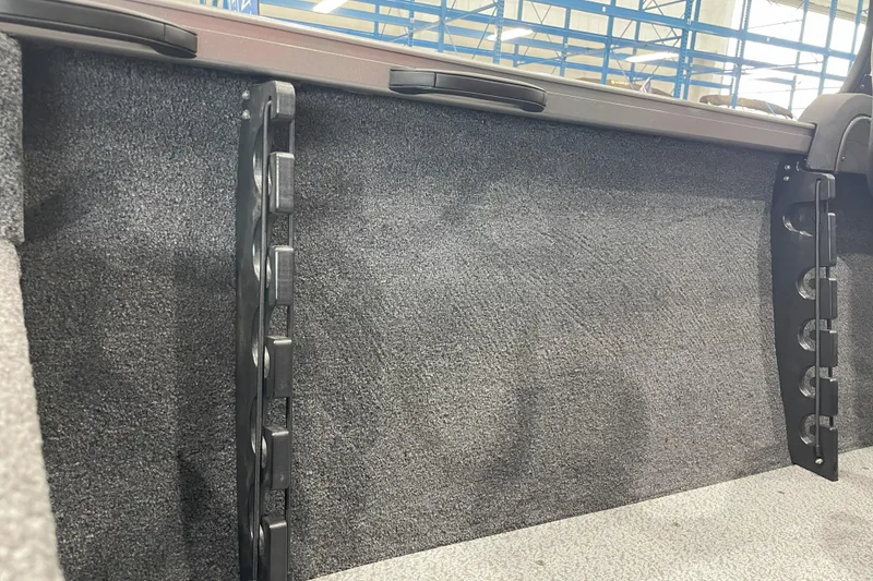 Slide: The Image of Interior view of 2026 Crestliner 1750 Hawk WT J boat with rod holders. - 17