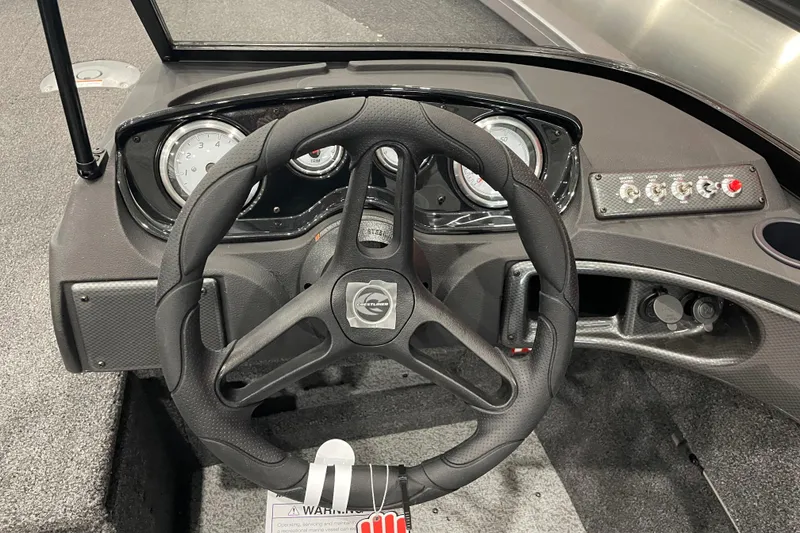 Slide: The Image of 2026 Crestliner 1750 Hawk WT J dashboard with steering wheel and instrument panel. - 8