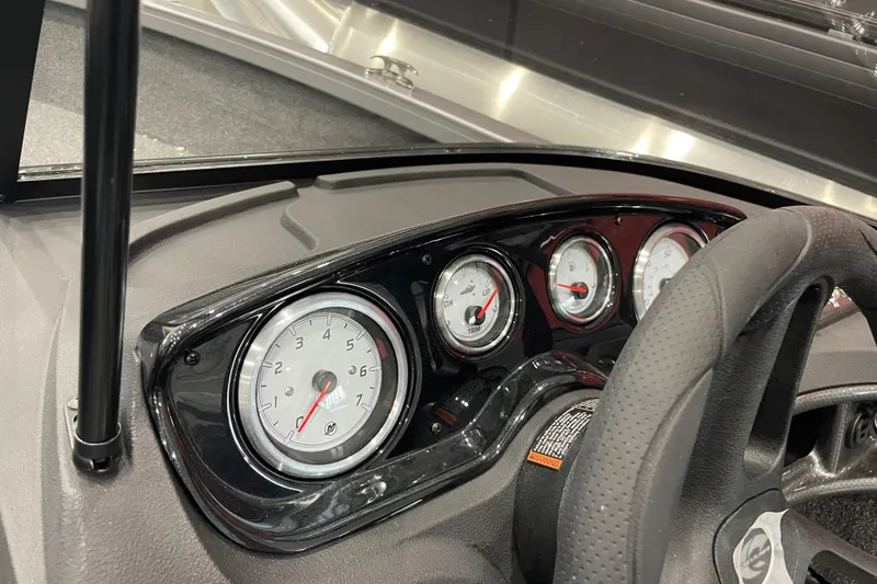Slide: The Image of Dashboard of 2026 Crestliner 1750 Hawk WT J boat with gauges and steering wheel. - 9