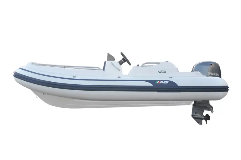 Slide: The Image of 2026 AB Inflatables Nautilus 15 DLX boat with Yamaha outboard motor, side view. - 1