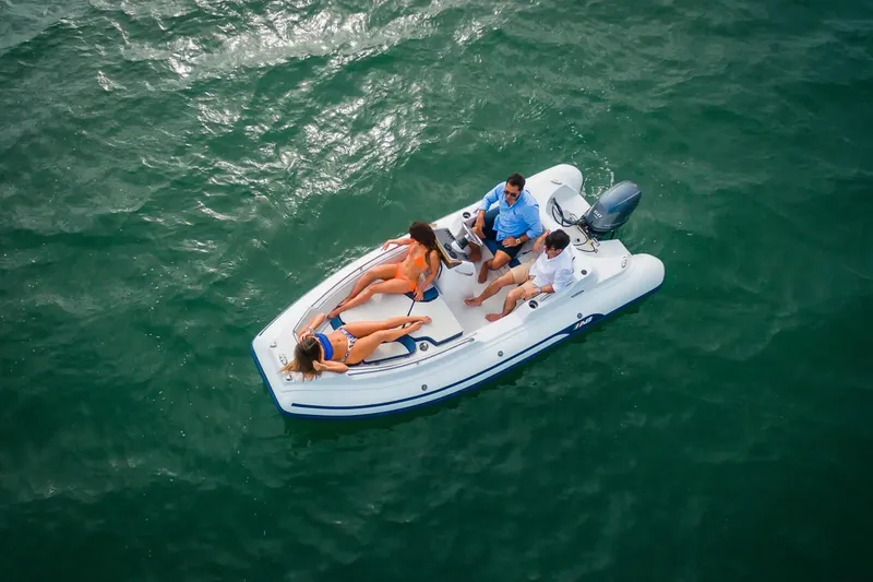 Slide: The Image of 2026 AB Inflatables Nautilus 15 DLX boat, top view, white and blue design. - 3