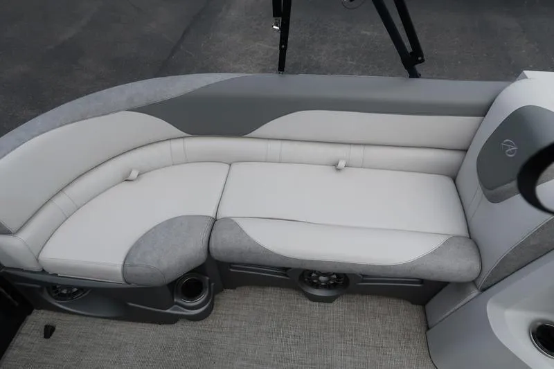 Slide: The Image of Luxurious seating on 2022 Avalon 26 LSV VRB boat, featuring gray and white upholstery. - 11