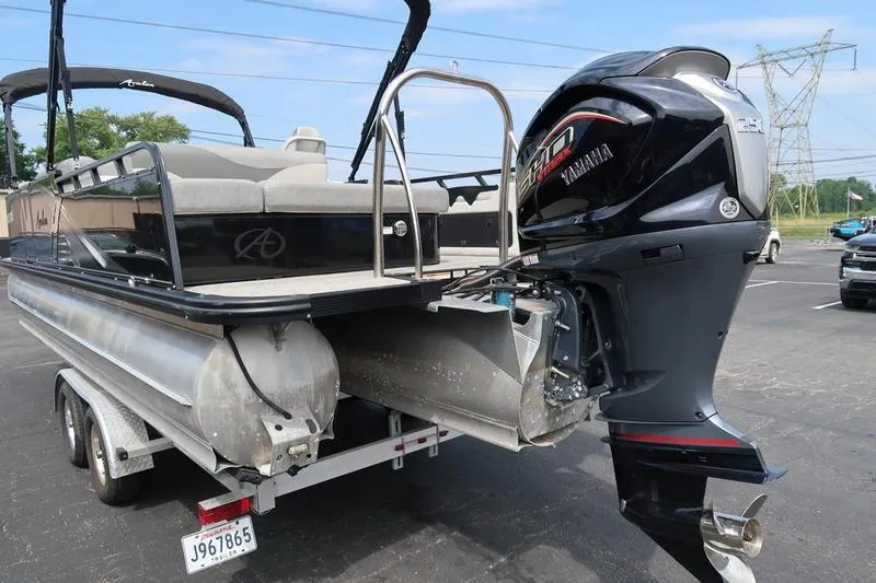 Slide: The Image of 2022 Avalon 26 LSV VRB pontoon boat with Yamaha outboard motor on trailer. - 12