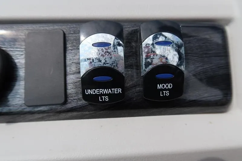 Slide: The Image of Switches for underwater and mood lights on 2022 Avalon 26 LSV VRB boat. - 19