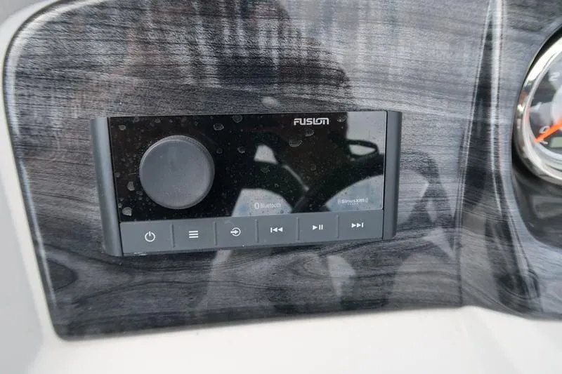 Slide: The Image of Fusion audio system on 2022 Avalon 26 LSV VRB boat dashboard. - 21