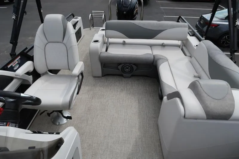 Slide: The Image of 2022 Avalon 26 LSV VRB boat interior with plush seating and modern design. - 27