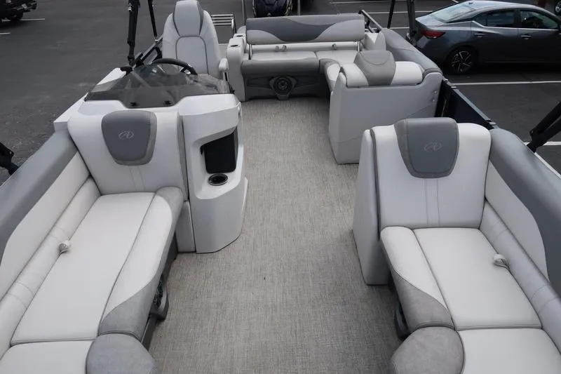 Slide: The Image of 2022 Avalon 26 LSV VRB pontoon boat interior with luxurious seating and modern design. - 5