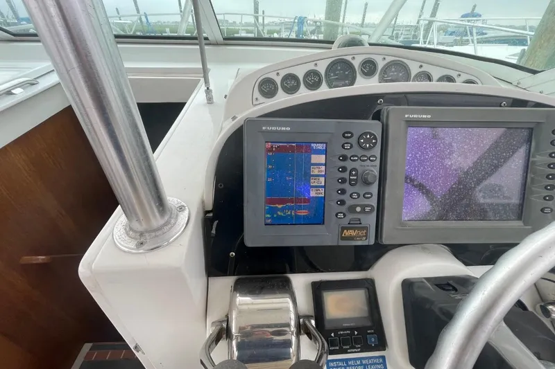 Slide: The Image of Helm of 1997 Luhrs 36 SX with Furuno navigation displays and controls. - 28