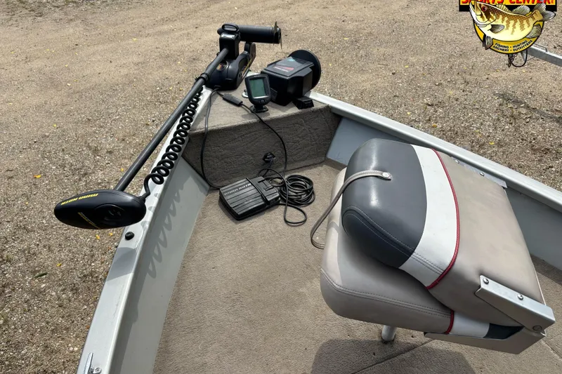 Slide: The Image of 2003 Tracker Pro Angler V 16 boat interior with trolling motor and seat. - 4