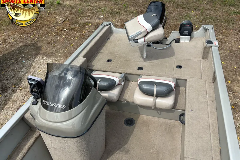 Slide: The Image of 2003 Tracker Pro Angler V 16 boat interior with seating and controls. - 5