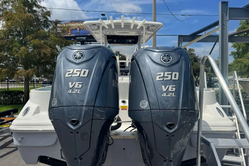 Slide: The Image of 2025 Key West 263 FS boat with dual Yamaha 250 V6 4.2L outboard engines. - 4