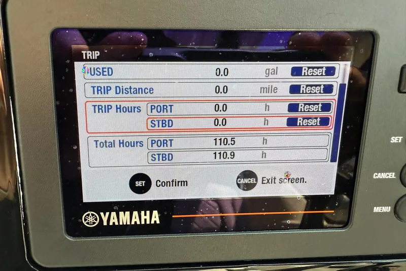 Slide: The Image of Yamaha display on 2023 Pursuit DC 266 Dual Console showing trip and total hours. - 30