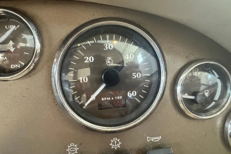 Slide: The Image of Close-up of 2002 Maxum 1800 SR boat dashboard gauges. - 19