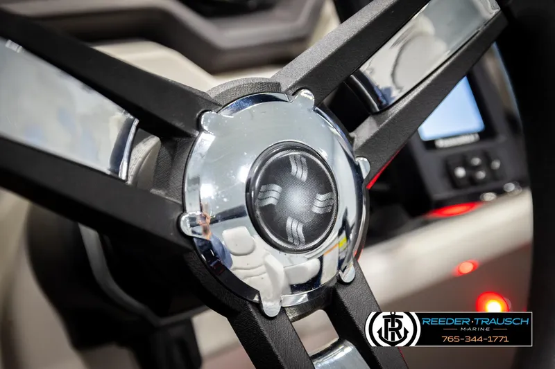 Slide: The Image of Close-up of 2023 Godfrey SW2286C steering wheel with chrome details. - 28