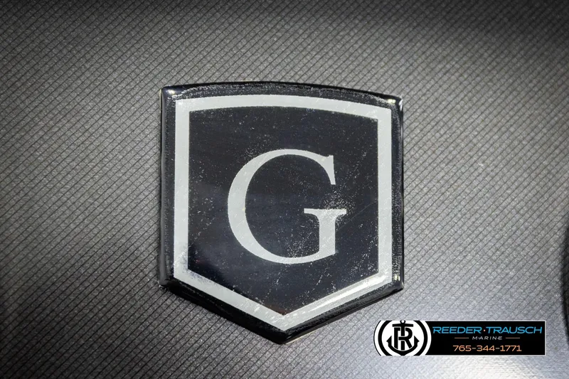 Slide: The Image of 2023 Godfrey SW2286C logo on textured surface, featuring bold 'G' emblem. - 32